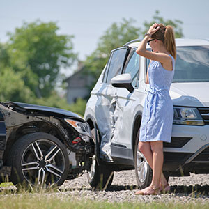 Worried driver after a car accident in Florida, highlighting uninsured at-fault driver concerns